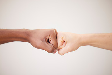 Image showing Fist bump, support and hands of people or friends together for justice, freedom and diversity with trust, collaboration and motivation on white background. Men together for power at peace protest