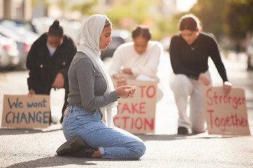 Image showing Protest, Islamic woman and pray in street, group and support for Palestine. Muslim female, girl or protesters with cardboard signs, fight for justice or change in society for oppression or solidarity