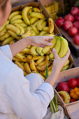 Image showing Banana, hands and woman with shopping in marketplace, outdoor and fresh, organic and healthy fruit and vegetables. Grocery shopping, market and customer choice of food, diet and nutrition with fruits