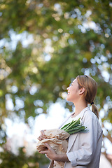 Image showing Woman, customer and grocery shopping with vegetables for natural eco friendly bag on mockup. Asian female shopper smiling holding healthy food for diet or green products for nutrition in nature