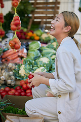 Image showing Customer, grocery shopping and vegetables with woman in market, discount and sale with happy consumer. Store, shopping and save with food, fresh and organic with health nutrition and retail product.