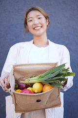 Image showing Grocery shopping, vegetables and woman with a bag in the city, supermarket food and happy with sale from the fruit store. Produce, smile and Asian girl show groceries with nutrition for diet