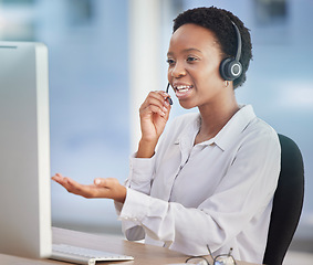 Image showing Black woman, customer support staff and call center employee working at desk of an online telemarketing business. Crm consultant, customer service and consulting client for computer or software issue