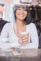 Image showing City, cafe window and portrait of woman with coffee and smile looking at street while drinking coffee. Relax, reflection in glass and happy woman customer in coffee shop with phone and credit card.