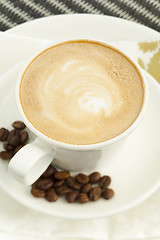 Image showing Coffee cup with cream foam