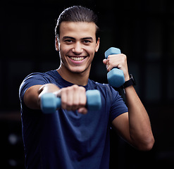 Image showing Portrait, fitness or man boxing with dumbbell for strength training, workout or cardio exercise in gym in Mexico. Smile, face or happy athlete boxer with sports champion pride or warrior mindset