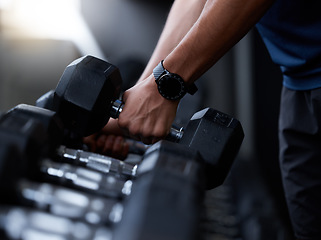 Image showing Fitness, dumbbell and hands of man at gym with smart watch for training, tracker or workout app. Strong, muscle and weightlifting with wearable tech on bodybuilder for sport, exercise or goal