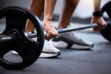 Image showing Barbell, fitness and strong hands of man in bodybuilder training for muscle power, legs challenge and workout. Sports, energy exercise and strong body builder in gym with feet zoom on floor or ground