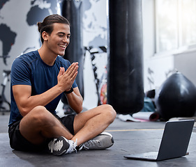 Image showing Fitness gym, laptop and video call, influencer and live streaming for social media, exercise and training. Happy smile, young male talking and communicating on video conference or webinar for workout