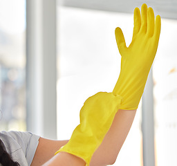Image showing Hands, woman and gloves for cleaning home, hygiene and wellness. Cleaning service, spring cleaning and female ready to start work, sanitize and disinfect to remove dust, germs or bacteria in house.