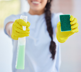 Image showing Cleaner woman, spray and sponge with gloves for hygiene, safety and chemical for dirt, house work and job. Cleaning expert, product and bottle to stop bacteria, germs and dust in hospitality service