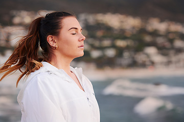 Image showing Woman, beach and relax meditation or thinking with closed eyes for calm mental health, freedom travel and mindfulness. Peace, ocean sunshine and relaxing mindset on traveling vacation in Cape Town