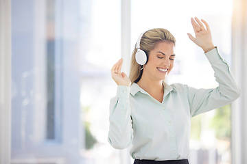 Image showing Business woman, headphones and dance in office, relax or celebrate success. Female entrepreneur, ceo and lady with earphones for music, audio or radio for stress relief, dancing or smile in workplace