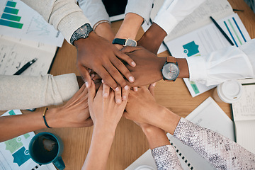 Image showing Teamwork, collaboration and stack of hands with documents, analytics report and infographics on desk. Support, diversity and top view of business people hands for community, partnership and trust