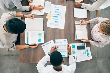 Image showing Collaboration, documents and financial with a business team working together in an accounting office from above. Meeting, data and finance planning with a man and woman accounting group at work