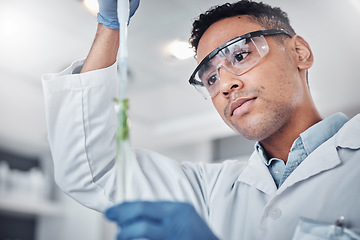 Image showing Plant science, pipette and man with test tube for researching plants. Laboratory, sustainability and male botanist with dropper and vial for testing, analyzing and gmo experiment to optimize growth.