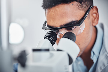 Image showing Scientist, microscope and man in laboratory working for healthcare testing, medical research and science innovation. Doctor, lab equipment and biotechnology analysis for chemical analytics sample