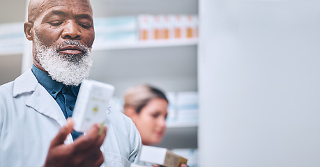 Image showing Pharmacy, black man and hand of pharmacist with medicine box mock up. Pills, medication and senior male medical professional with drugs for prescription, healthcare and wellness, cure or treatment.