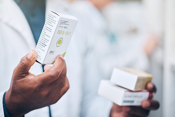 Image showing Pharmacy, black man and hand of pharmacist with medicine boxes. Pills, medication and male medical professional with drugs for prescription, healthcare and wellness, cure or treatment in drug store.