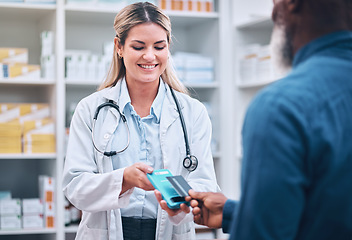 Image showing Payment, credit card or patient with pharmacist at pharmacy for prescription medicine or medical treatment. Shopping, insurance or happy doctor helping a senior black man buying healthcare products