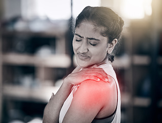 Image showing Woman, fitness and shoulder pain in gym for exercise workout, training accident and sports medical emergency. Sad athlete, arm injury and physical therapy, arthritis or muscle wellness in health club