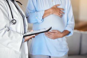 Image showing Doctor, tablet and pregnant woman at hospital for consultation. Pregnancy, healthcare and mother consulting medical professional with hands on touchscreen tech for help or assistance with maternity.