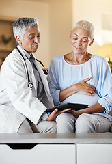Image showing Pregnant, woman and senior ivf doctor on tablet for planning, results and discussion on sofa during home checkup. Healthcare, pregnancy and consulting with mature doc while checking online plan