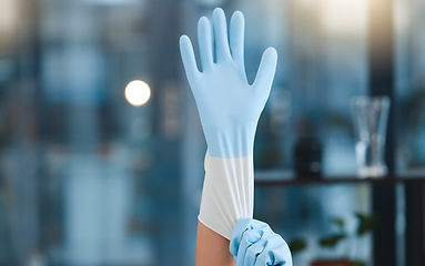 Image showing Hands, cleaning gloves and woman in home getting ready for hygiene at night. Spring cleaning, cleaning service and maid, worker or cleaner preparing to start washing or disinfection in dark house