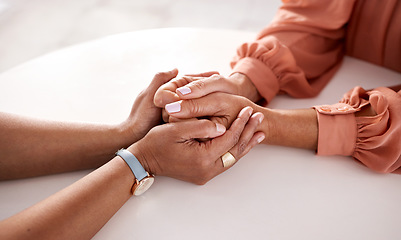 Image showing Hands, women and holding closeup in support of comfort, empathy and unity in crisis, cancer or bad news. Hand, zoom and friends holding hands for hope, trust and prayer for girl suffering depression