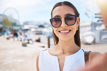 Image showing Travel, happy or woman taking selfie on holiday vacation in summer in Las Vegas, USA with freedom. Smile, fashion sunglasses or portrait of cool girl tourist taking pictures for social media content