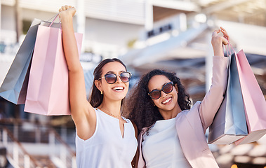 Image showing Women, shopping and friends in city, bags or sale products for luxury boutique or purchase fashion. Females, girls or customers spending money, retail for spree or expensive clothes for clients