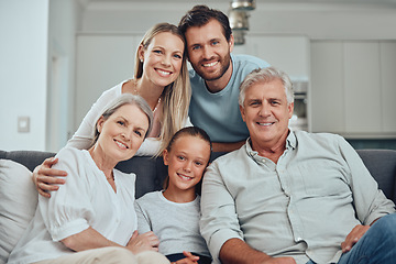 Image showing Portrait of grandparents, parents and child on sofa enjoying holiday, weekend and quality time together. Big family, love and senior couple bonding with mom, dad and girl on couch in family home
