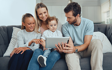 Image showing Family, tablet and on couch with parents, children or watch cartoon for bonding. Mother, father and baby with female child, streaming or connectivity for social media, loving or quality time together