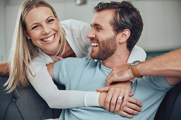 Image showing Portrait, love and couple relax on a sofa, embrace and smile while bonding in their home together. Face, man and woman hug, happy and enjoy quality time, relationship and fun in their living room