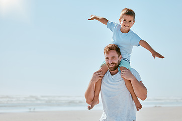 Image showing Father, kid and piggy back at beach on vacation, holiday or trip mock up. Family love, care and portrait of man bonding with boy while carrying him on shoulders, having fun and enjoying time together