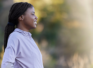 Image showing Black woman runner, smile and focus for outdoor training summer exercise or workout in nature. Happy fitness expert, running and vision for marathon, race or competition for health, wellness and body