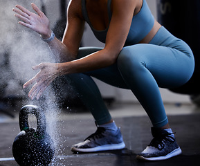 Image showing Woman, powder hands and kettlebell exercise, challenge and workout in gym, fitness club and body muscle. Zoom of bodybuilder, chalk and weightlifting, grip and weight training, performance and power