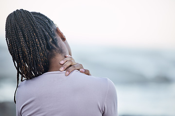 Image showing Back, black woman and neck pain with stress, injury and chronic pain. Jamaican female, lady and athlete with tension in the shoulders, muscle strain and massage for healthcare, wellness or overworked