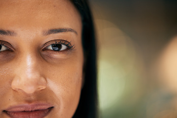 Image showing Eyes, face and beauty of a woman on a blurred background with bokeh and mockup or free space for advertising and marketing. Portrait of detail, skin and cosmetics of a female with zoom on pores