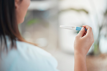 Image showing Woman, hands and pregnancy test with results, information and blank at home. Closeup girl check infertility with stick for maternity, family planning and ovulation ovulation from ivf for healthcare