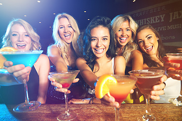 Image showing Party, cocktails and women friends cheers for celebration of birthday, new years or happy hour at a nightclub or event with alcohol. Female group celebrate with drinks for ladies night at a club