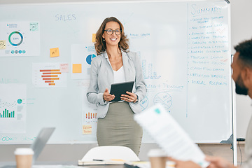 Image showing Business woman, tablet or whiteboard presentation for company finance analytics, investment growth education or team sales analysis. Mature mentor, manager or ceo in training workshop with technology