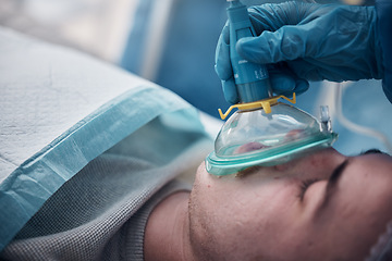 Image showing Anesthesia, oxygen mask and medical with man in surgery for breathing, ventilation and operation. Healthcare, cardiology and paramedic with face of patient and doctors in operating room for emergency