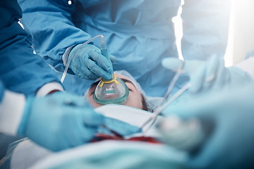 Image showing Doctors, surgery and oxygen mask with a medicine team in scrubs operating on a man patient in a hospital. Doctor, nurse and teamwork with a medical group in a clinic to perform an emergency operation