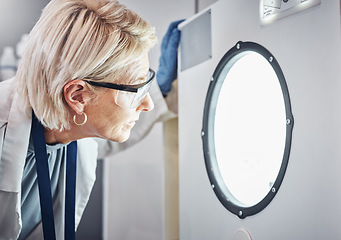 Image showing Scientist, worker or laboratory autoclave equipment in medical research, vaccine temperature control or dna engineering. Zoom, thinking face or mature woman or science centrifuge machine for medicine