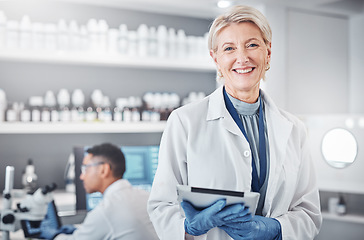 Image showing Tablet, portrait or senior scientist in laboratory with a happy smile, growth mindset or goals in medical science. Face, woman or mature doctor with dna health data or genetic research knowledge