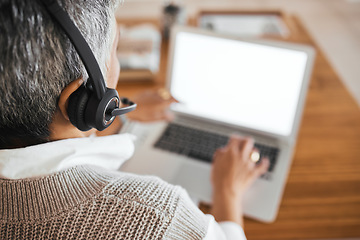 Image showing Senior woman, headphones and working on laptop for telemarketing communication, customer service consulting and crm contact us support. Mature call center agent, typing and digital consultant back