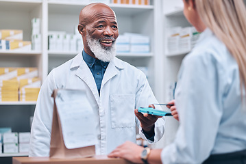 Image showing Pharmacist, customer or credit card machine in medicine retail purchase, healthcare wellness treatment or prescription pills buy. Happy smile, mature pharmacy worker and woman or electronic pay nfc