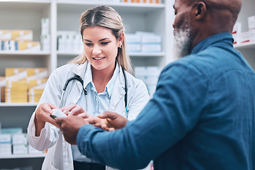 Image showing Healthcare, pharmacist and man at counter, medicine, prescription drugs and happy service at drug store. Health, wellness and medical insurance, black man and woman at pharmacy for advice and pills.