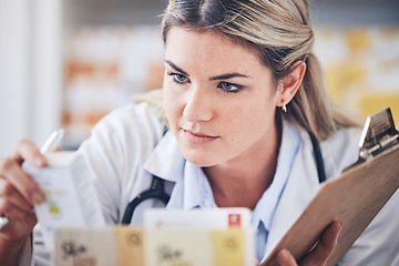 Image showing Pills, pharmacy or pharmacist with a checklist for medicine products stock supply or inventory in a clinic. Management, woman or doctor with drugs to monitor medical healthcare supplements in store